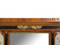 A North Italian Ebonized and Gilt Metal Mounted Walnut Overmantel Mirror