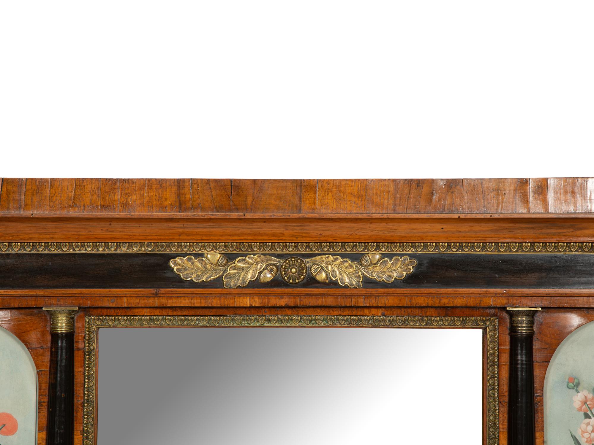 A North Italian Ebonized and Gilt Metal Mounted Walnut Overmantel Mirror