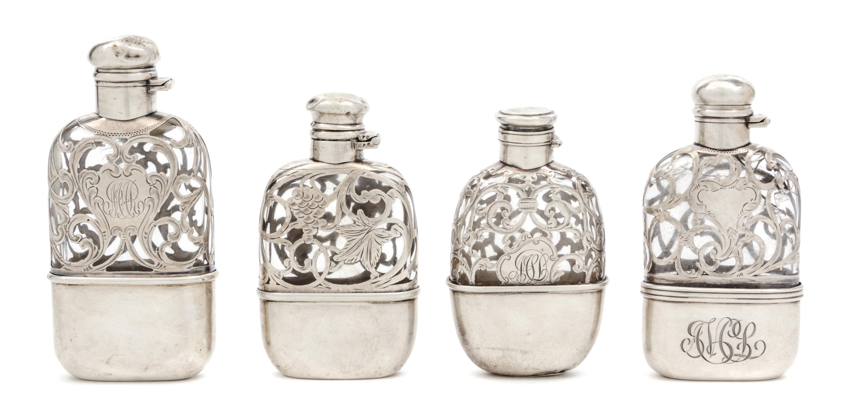 Four Silver Overlay Glass Flasks Height of tallest 4 3/4 inches.