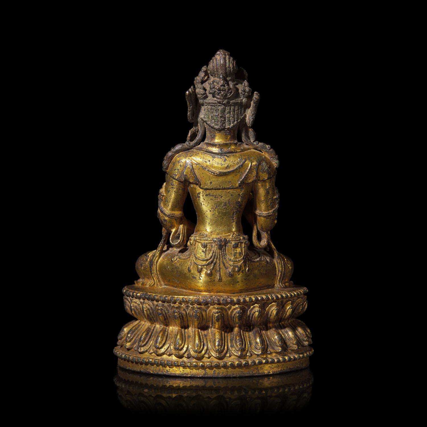 A Chinese Gilt Bronze Figure of a Seated Bodhisattva, Ming Dynasty, 15th Century 明 銅鎏金菩薩坐像