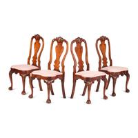 A Set of Four Queen Anne Style Shell and Volute Carved Cherrywood Compass-Seat Claw-and-Ball Foot Side Chairs