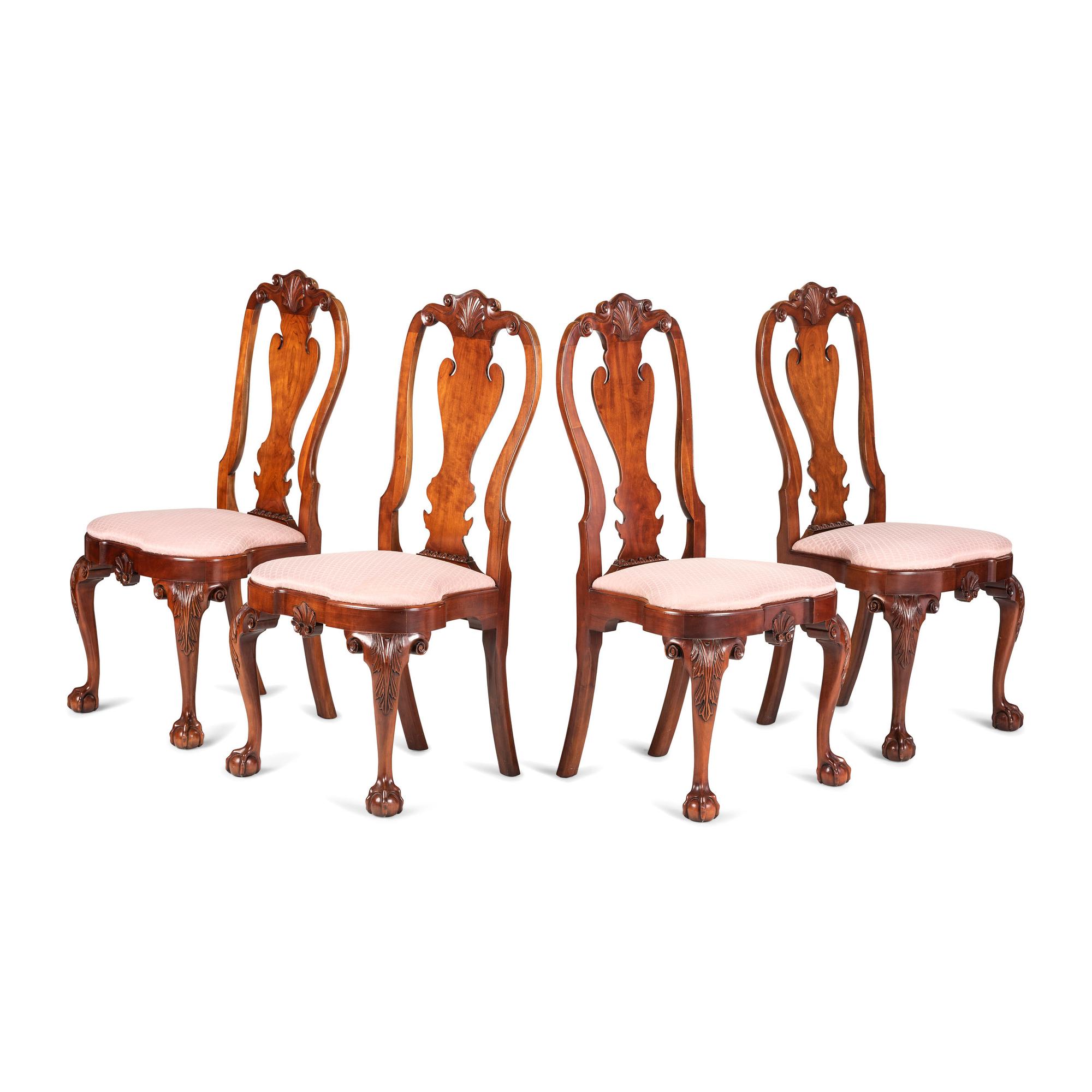 A Set of Four Queen Anne Style Shell and Volute Carved Cherrywood Compass-Seat Claw-and-Ball Foot Side Chairs