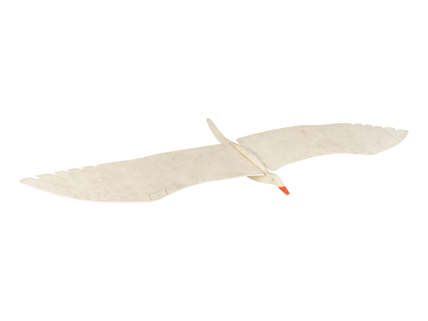 A Kinetic Painted Gull Together with a Quilt