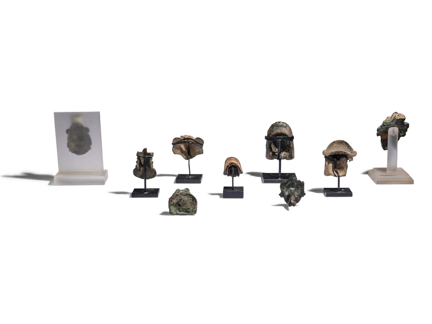 Nine Roman Bronze Masks