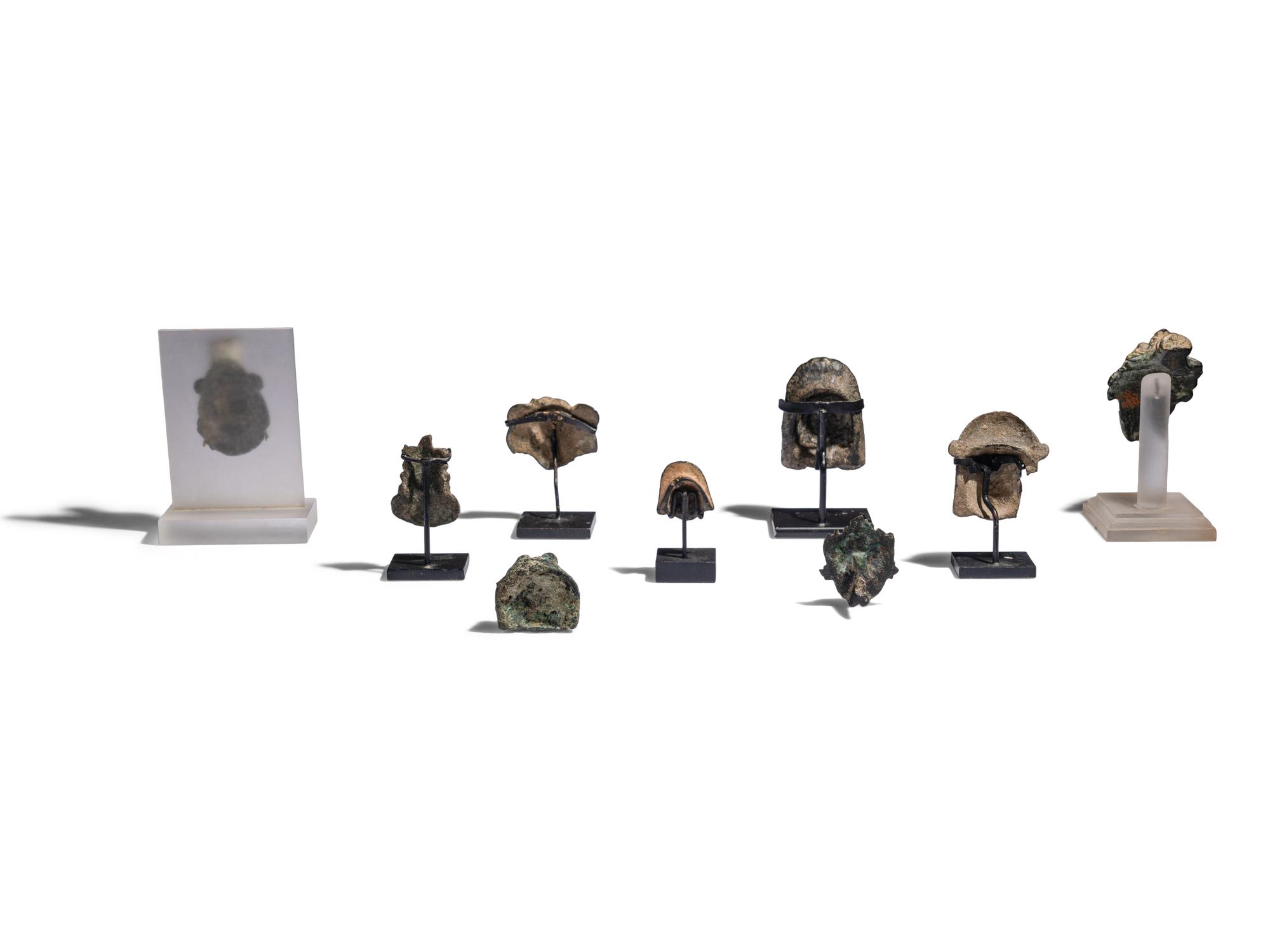 Nine Roman Bronze Masks