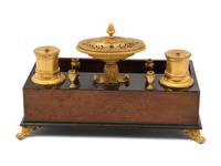 A French Gilt Bronze and Parcel Ebonized Burlwood Encrier