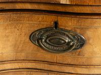 A George III Walnut and Mahogany Serpentine Sideboard