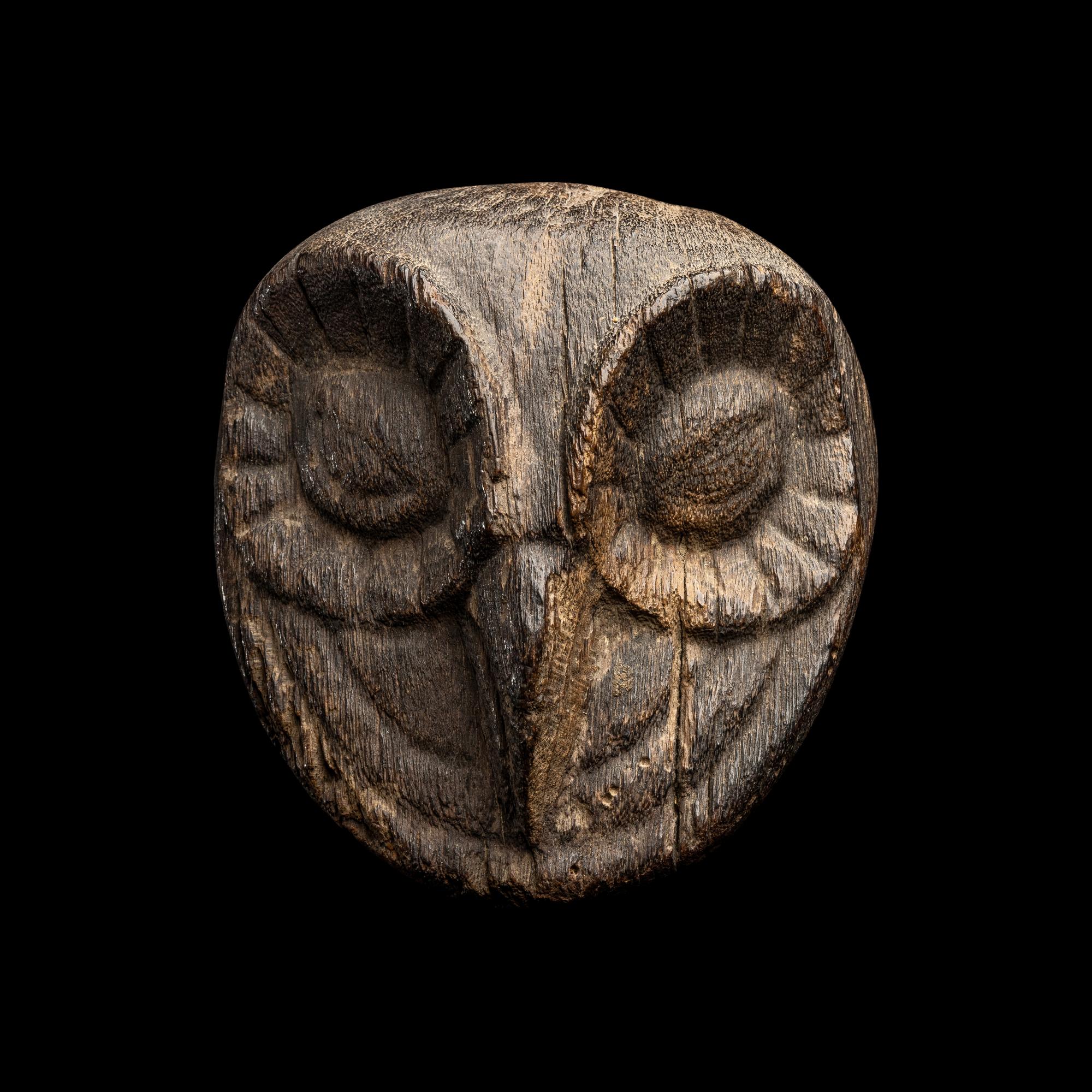 An Early Mochica Algarroba Wood Owl's Head