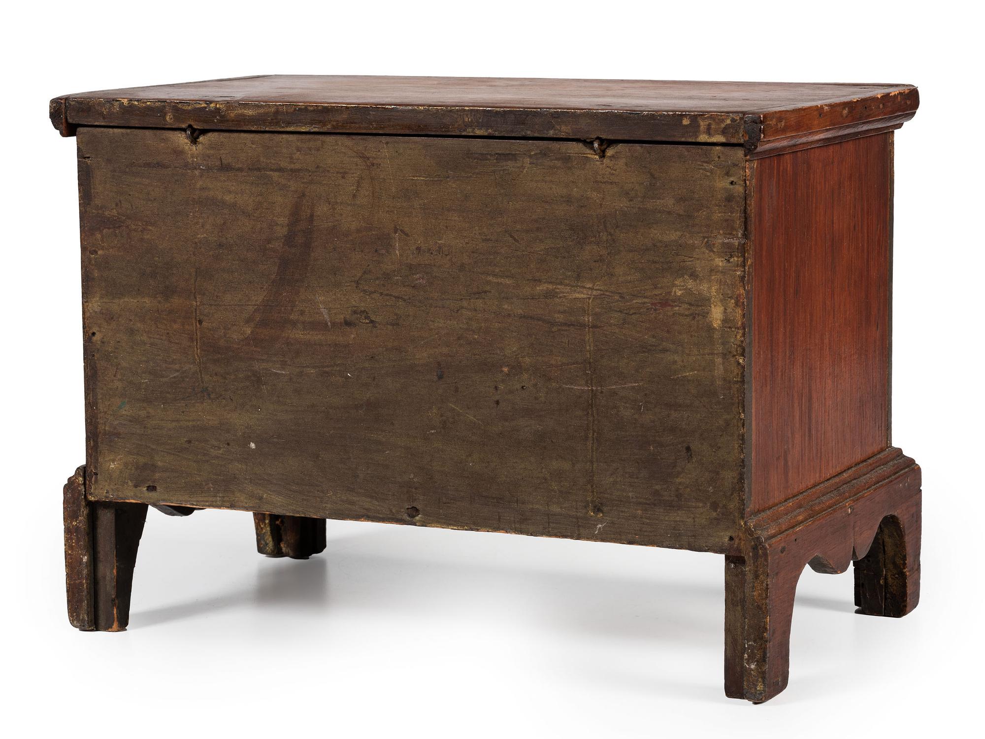 A Diminutive Pine Lift-Top Chest