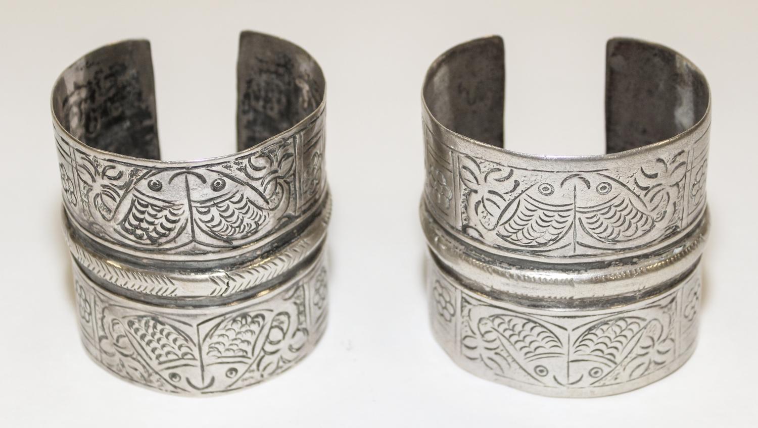 Two Middle Eastern Silver Cuffs Diameter of exterior 2 3/4 inches.