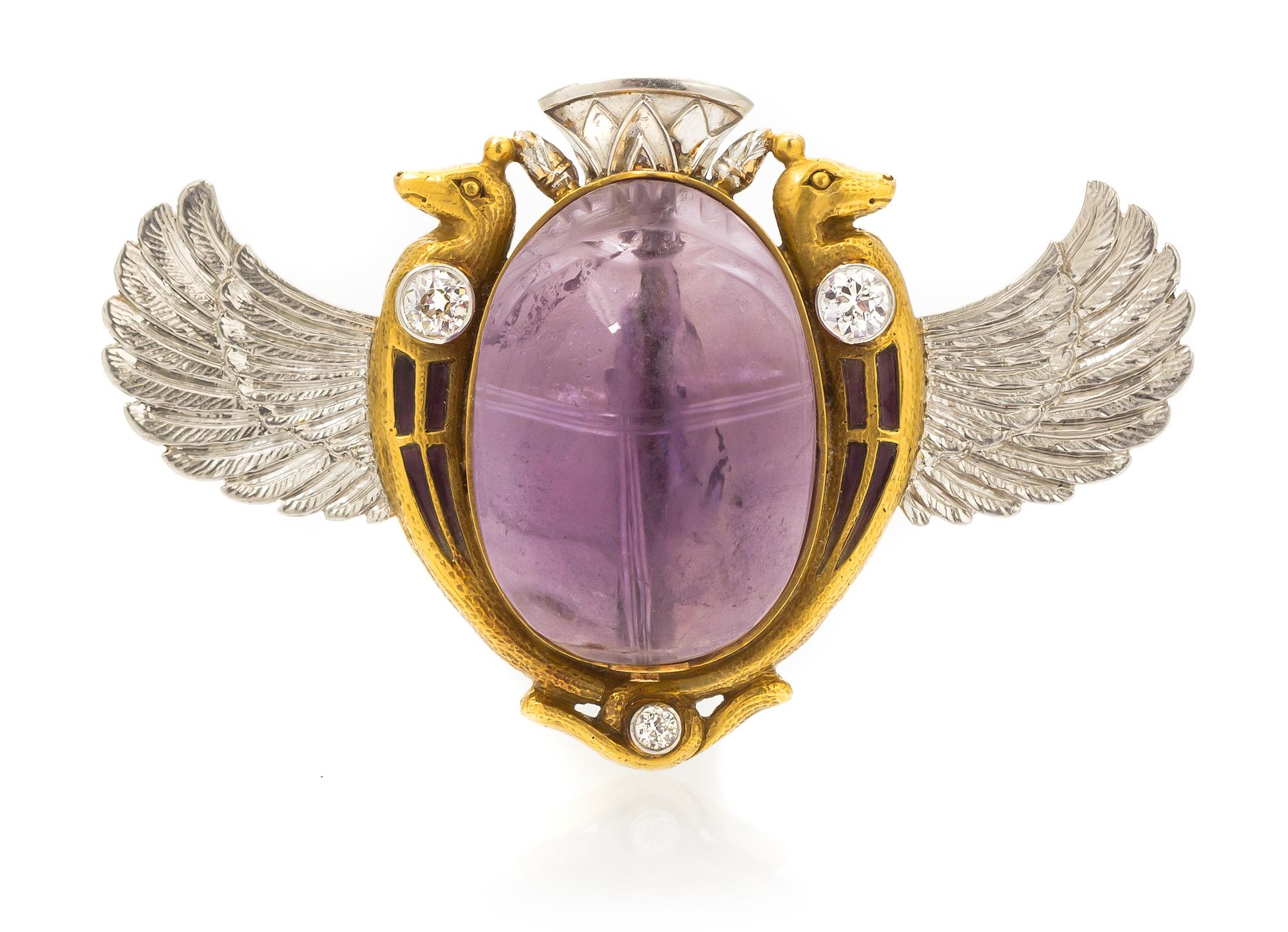 An Egyptian Revival Platinum, Gold, Enamel, Amethyst and Diamond Winged Scarab Brooch, 11.40 dwts.