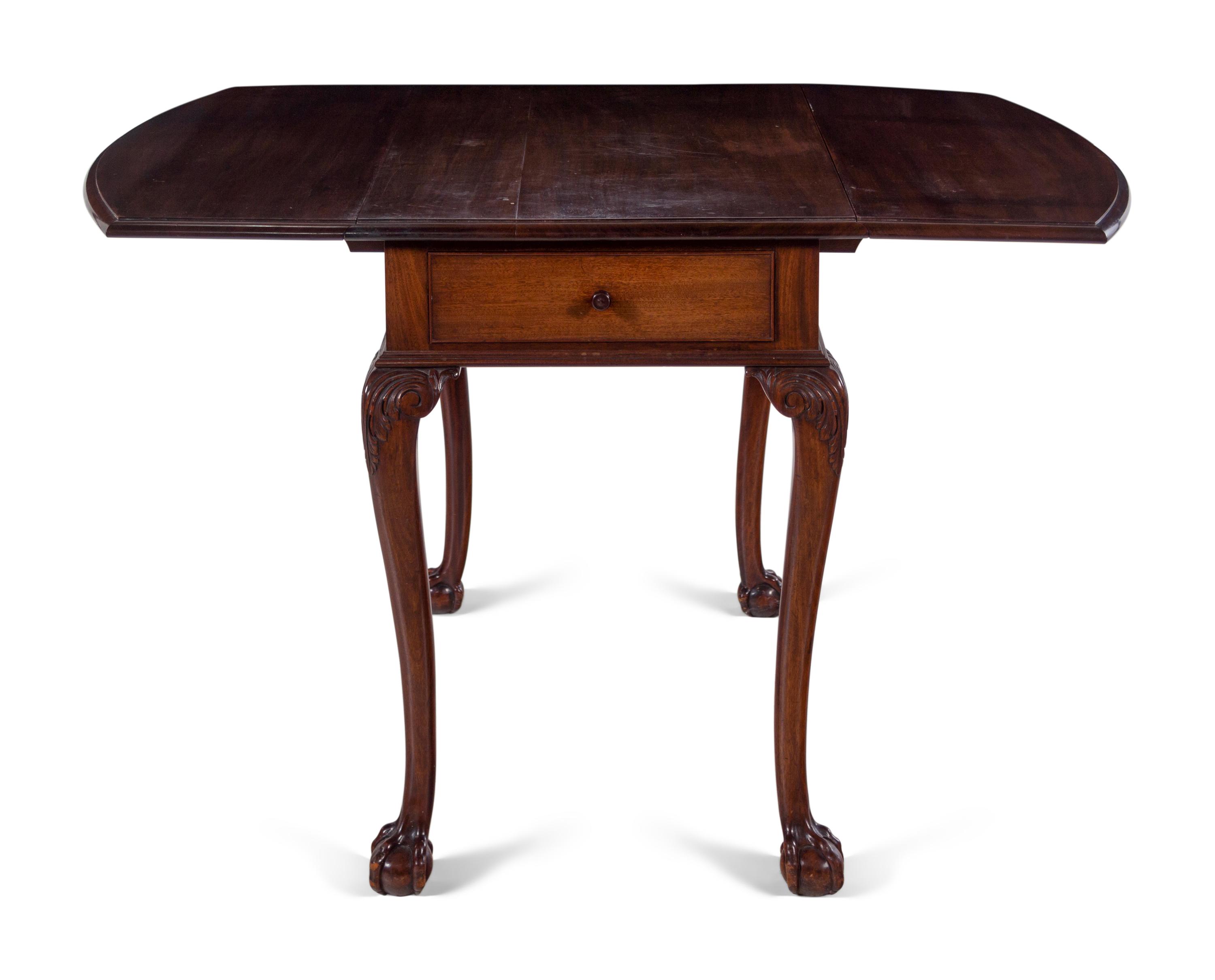 A George II Style Mahogany Drop-Leaf Table