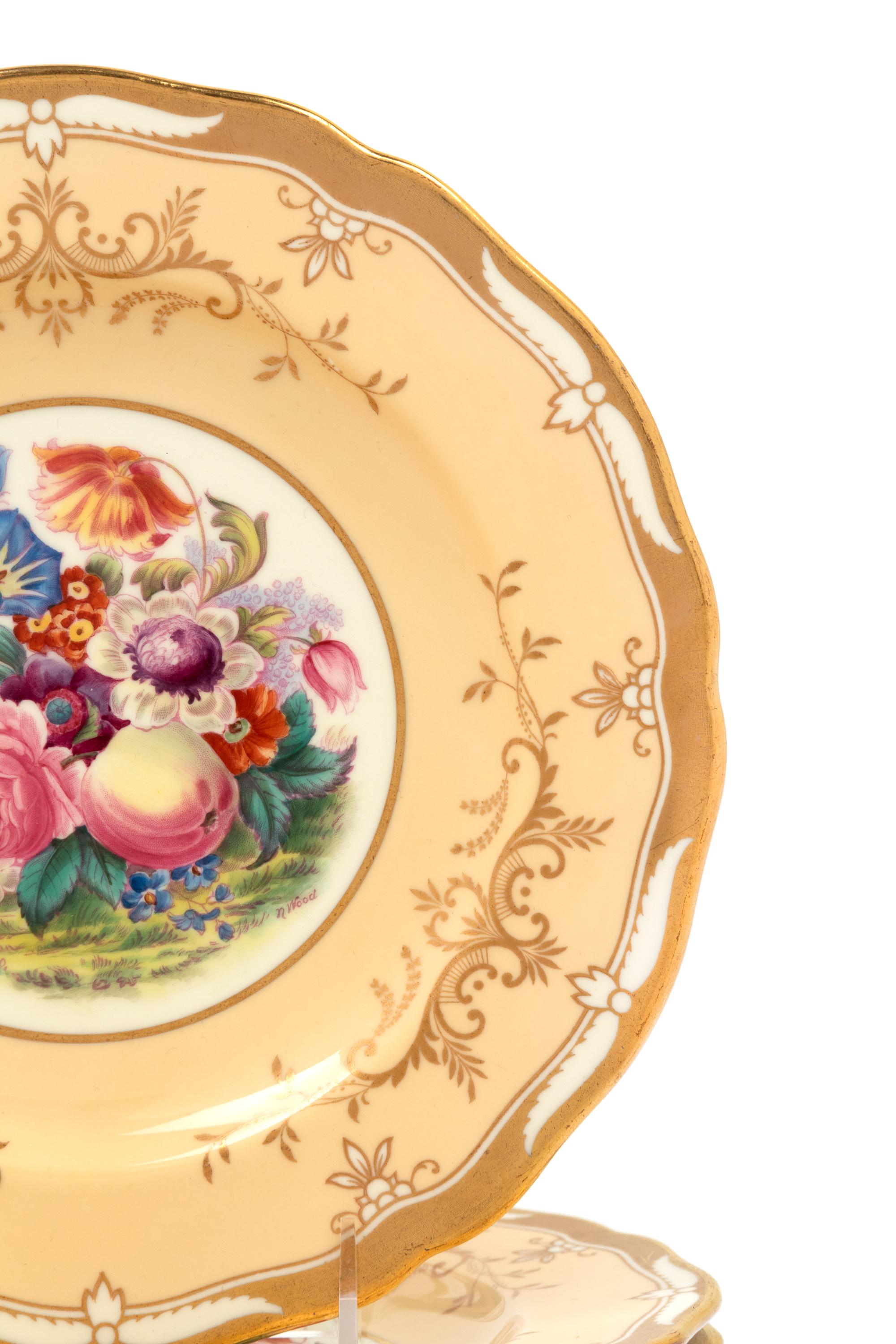 A Set of Twelve Spode Hand Painted Parcel Gilt Dinner Plates
