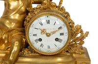 A Louis XVI Style Gilt Bronze and White Marble Mantel Clock