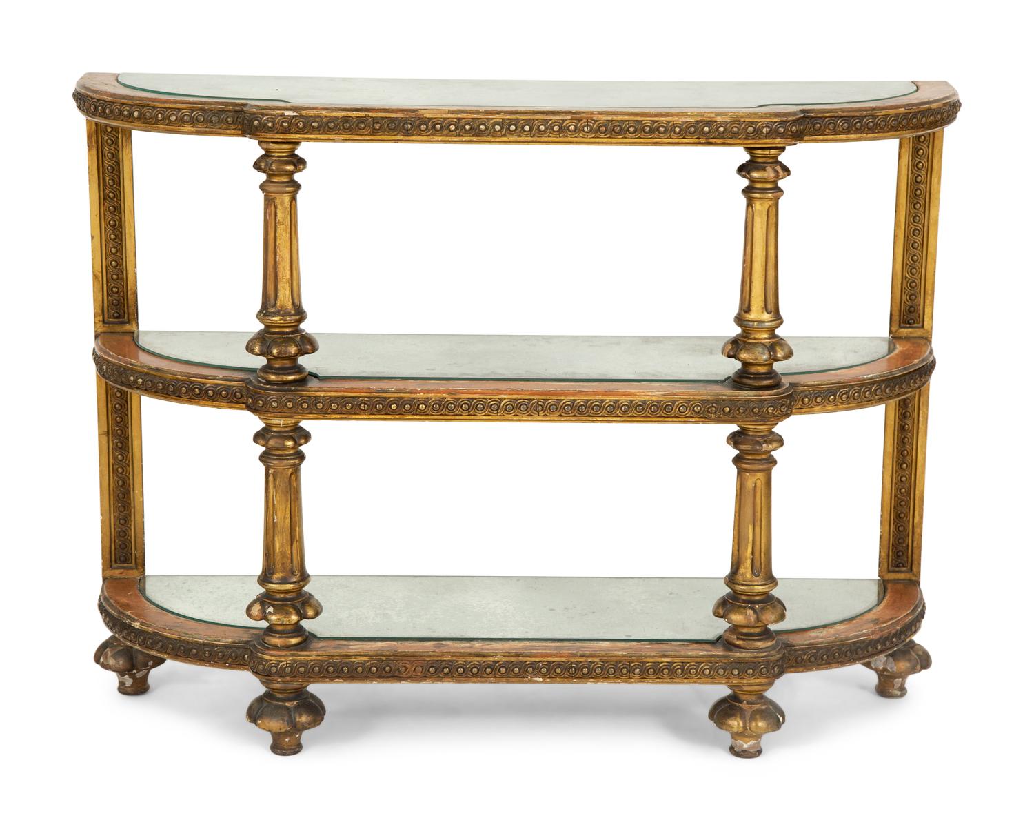 An Italian Carved and Painted Three Tier Etagere Console