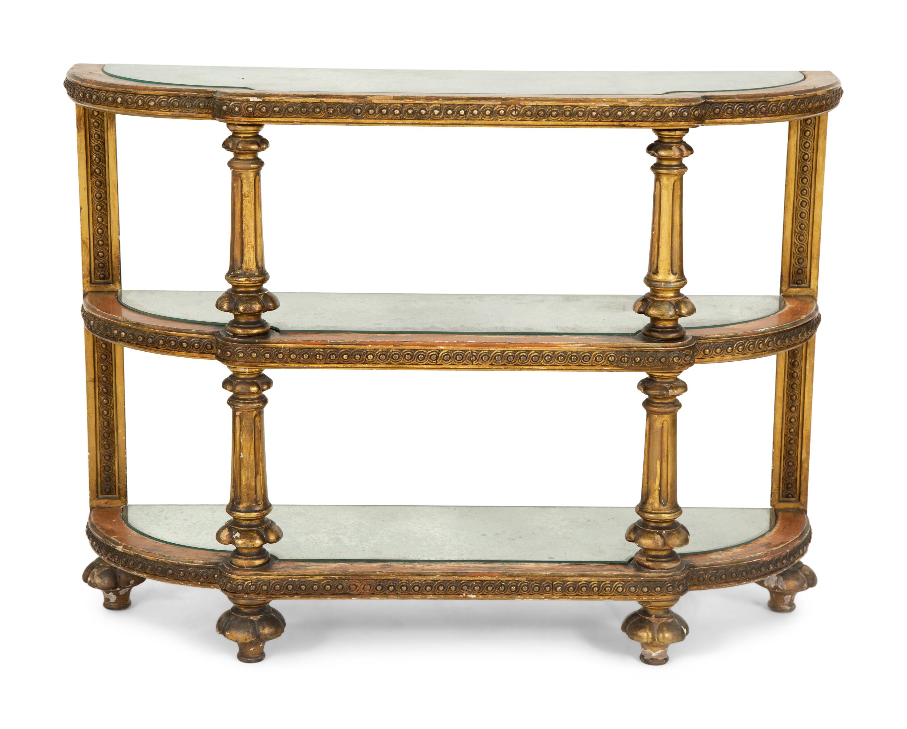 An Italian Carved and Painted Three Tier Etagere Console
