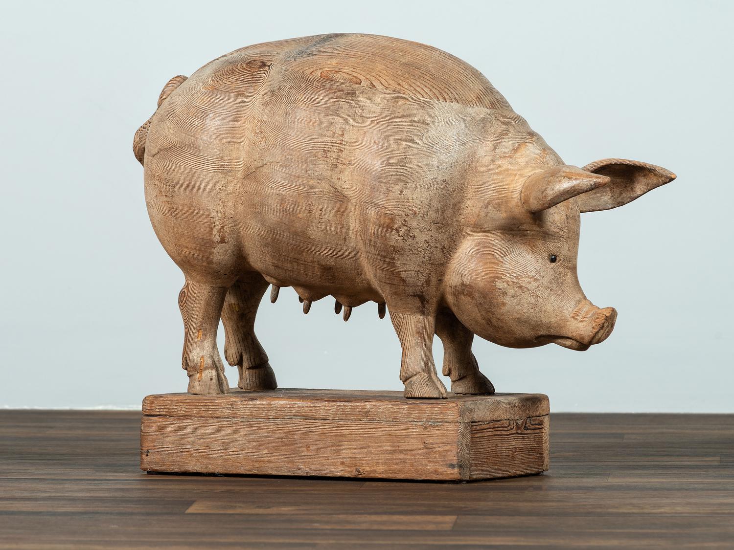 A Folk Art Carved Wood Figure of a Sow