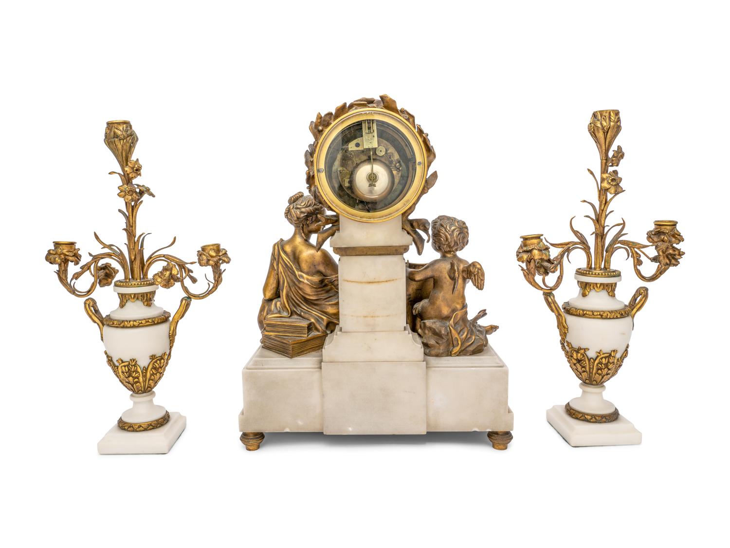 A French Gilt Bronze and Marble Clock Garniture