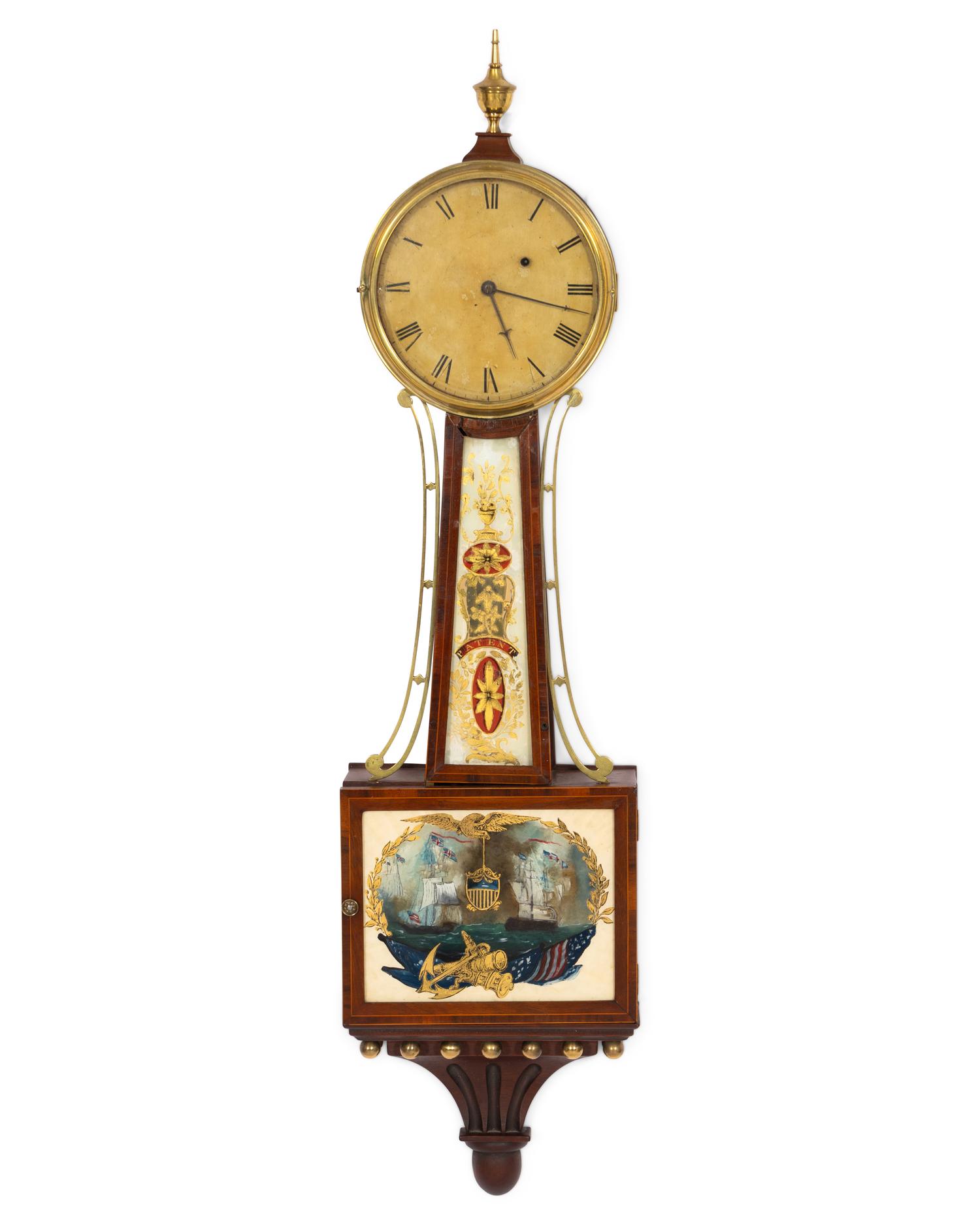 A Federal Style Mahogany and Verre Eglomise Banjo Clock