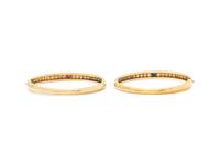 VAN CLEEF & ARPELS, PAIR OF YELLOW GOLD, DIAMOND, RUBY AND SAPPHIRE BANGLE BRACELETS