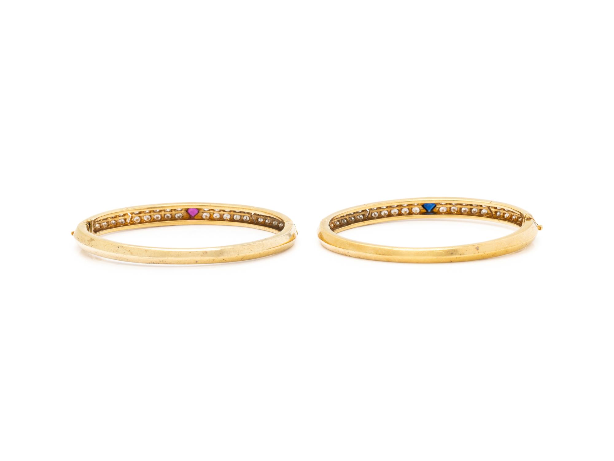 VAN CLEEF & ARPELS, PAIR OF YELLOW GOLD, DIAMOND, RUBY AND SAPPHIRE BANGLE BRACELETS