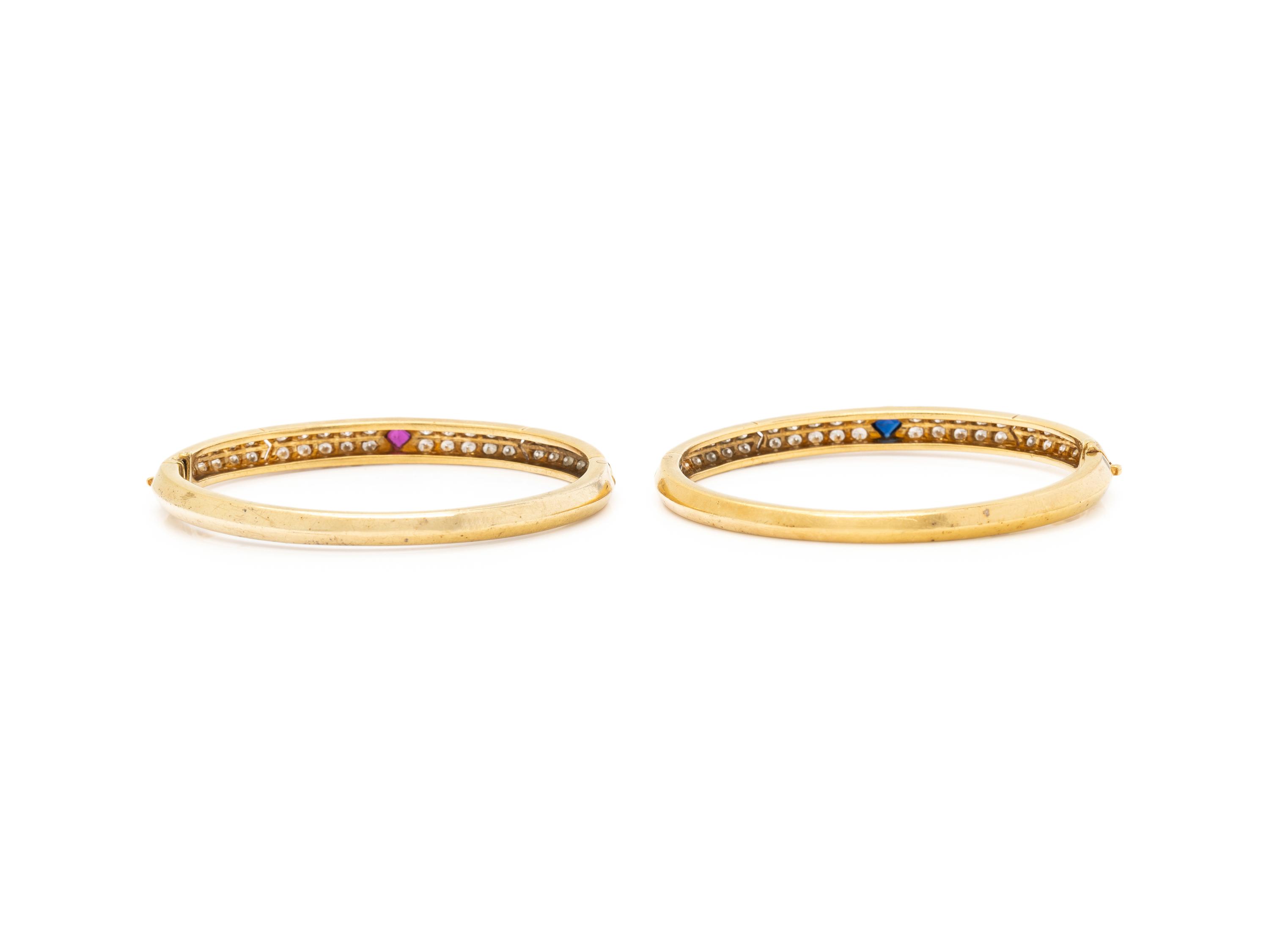 VAN CLEEF & ARPELS, PAIR OF YELLOW GOLD, DIAMOND, RUBY AND SAPPHIRE BANGLE BRACELETS