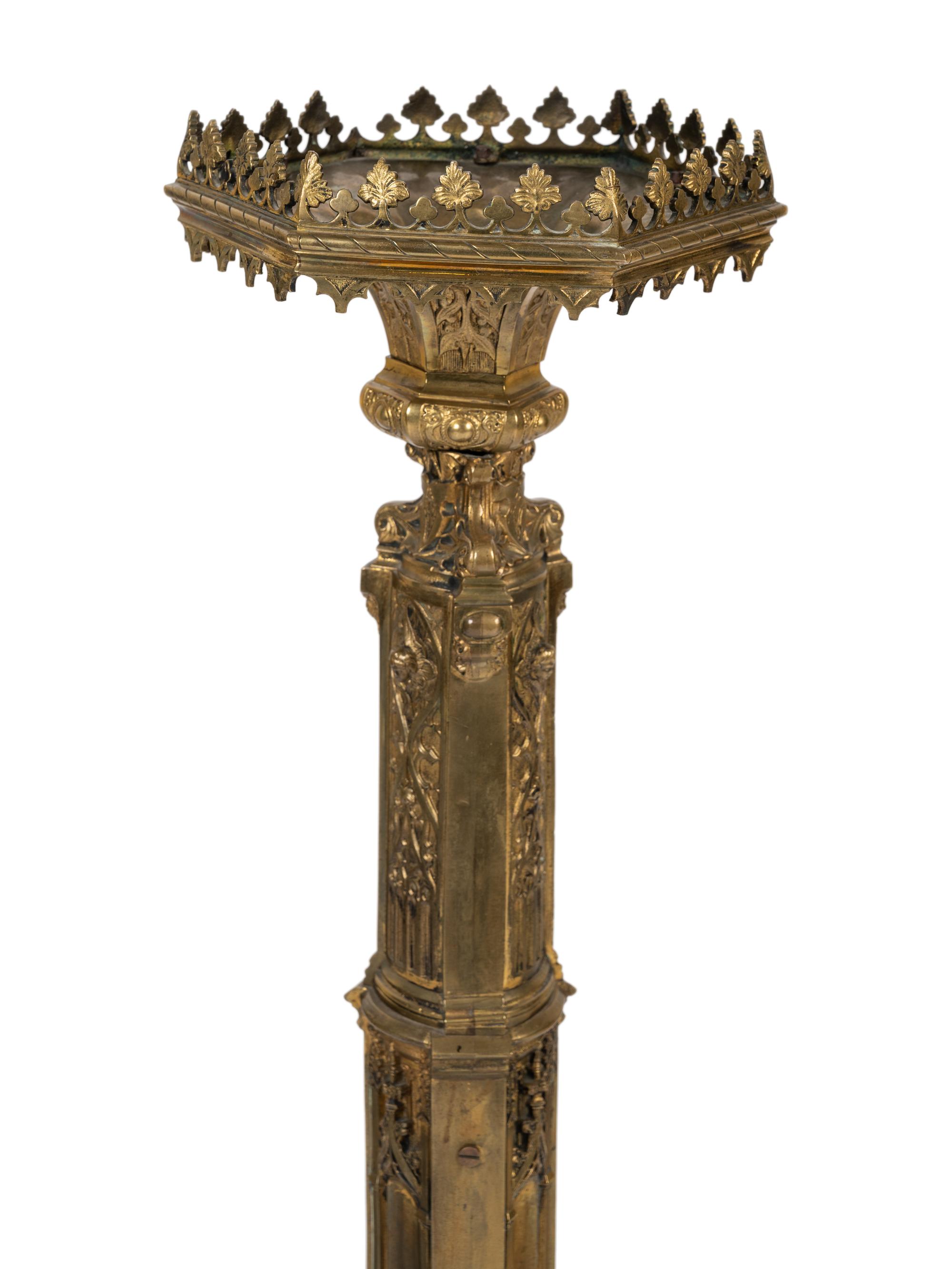 A Gothic Revival Gilt Metal Pricket