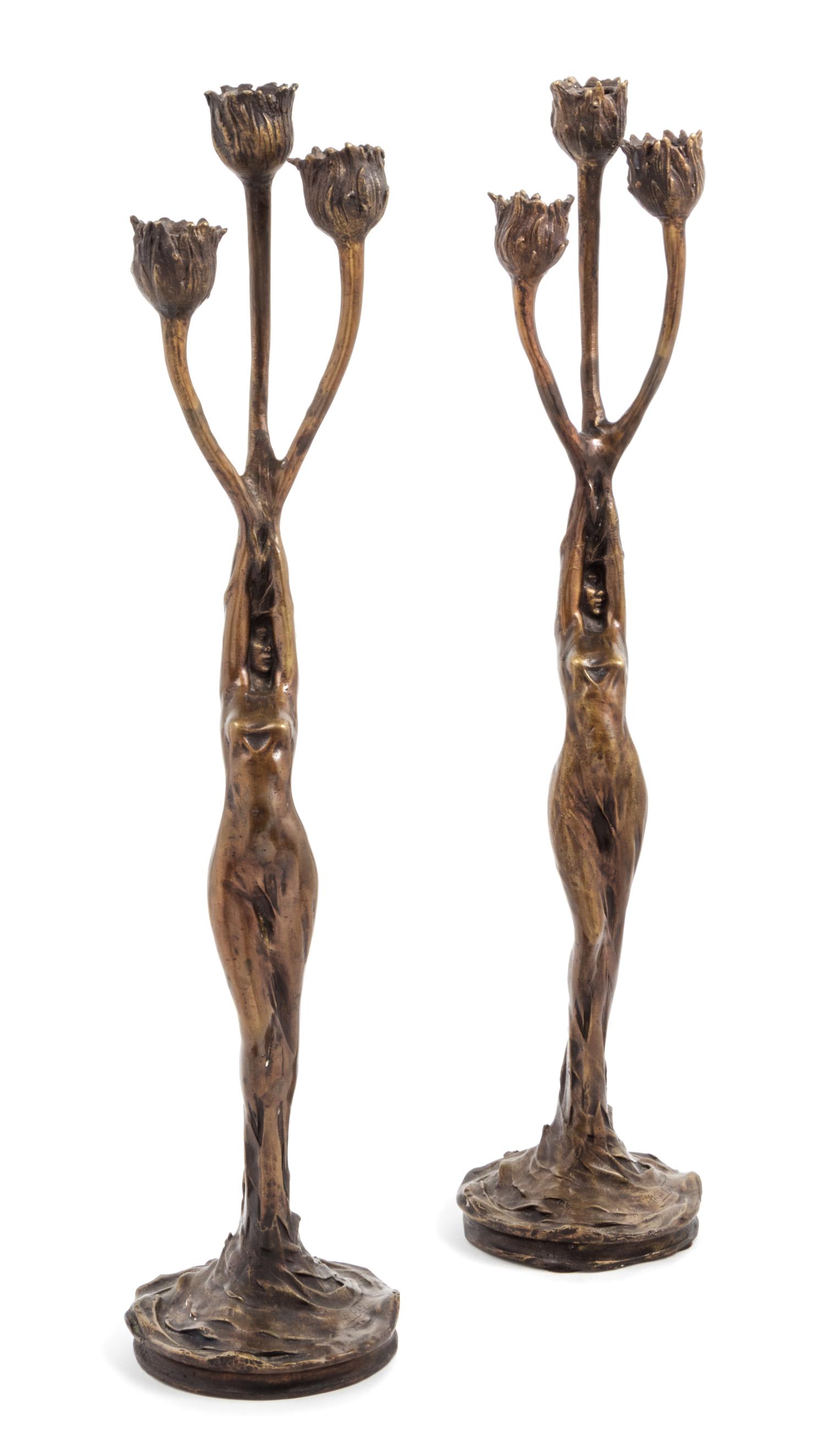 After Firmin Bate, FRANCE, 20TH CENTURY, a pair of Art Nouveau three-light candelabra