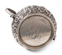 A Repousse Silver Three-Piece Tea Service
