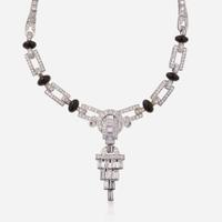 A Platinum, Diamond, and Onyx Necklace