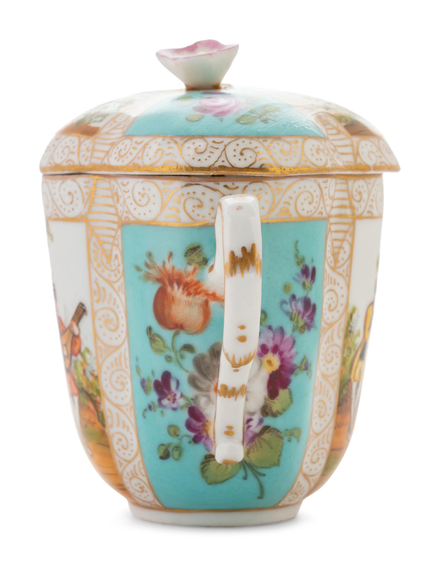 A German Porcelain Covered Cup and Saucer