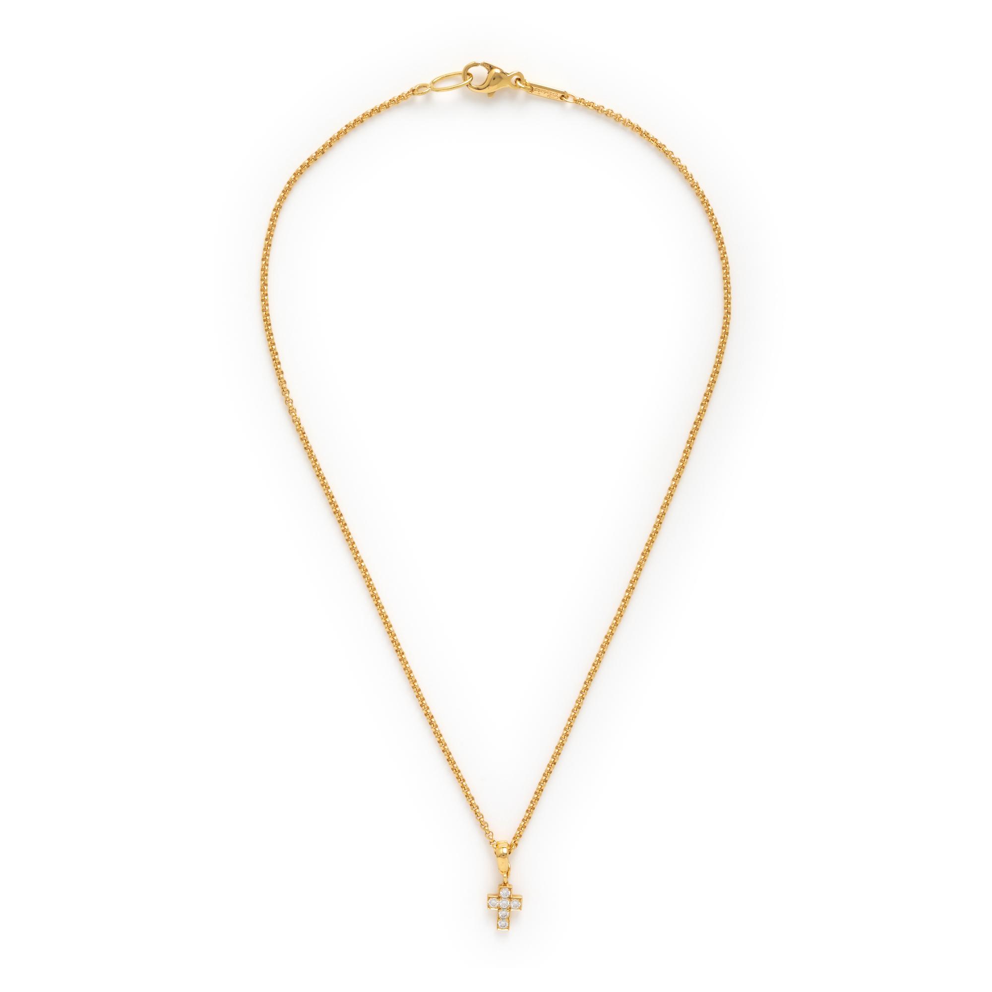 Cartier, Diamond and Yellow Gold Cross Pendant with a Chopard Yellow Gold Chain