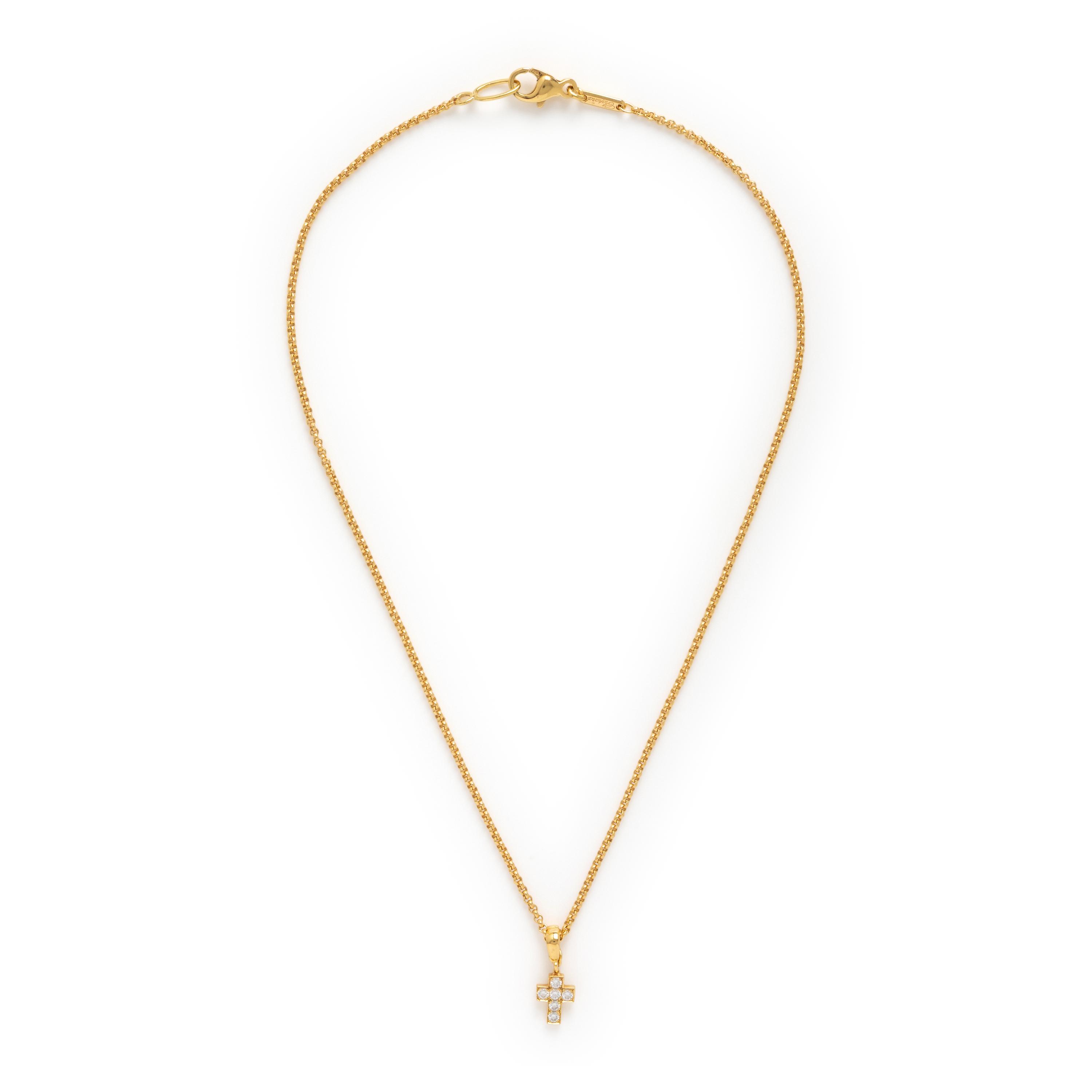 Cartier, Diamond and Yellow Gold Cross Pendant with a Chopard Yellow Gold Chain