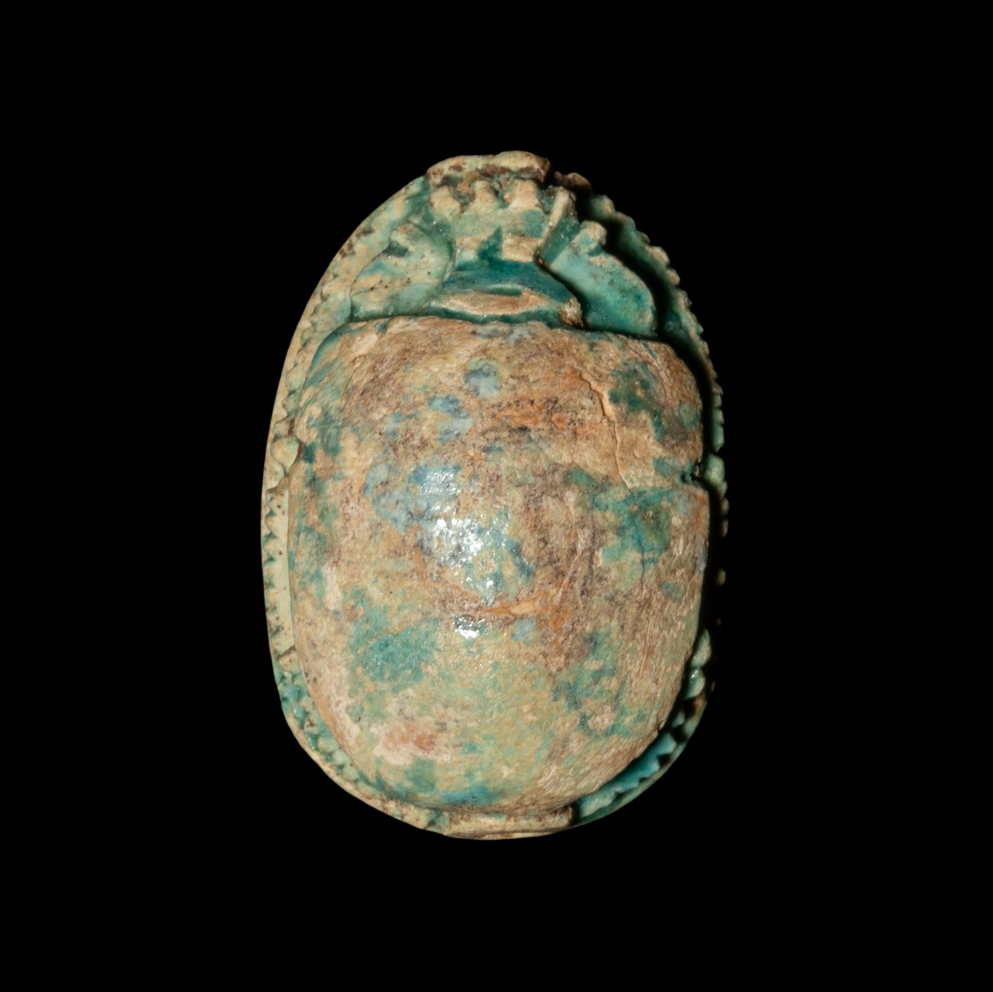 An Egyptian Faience Scarab