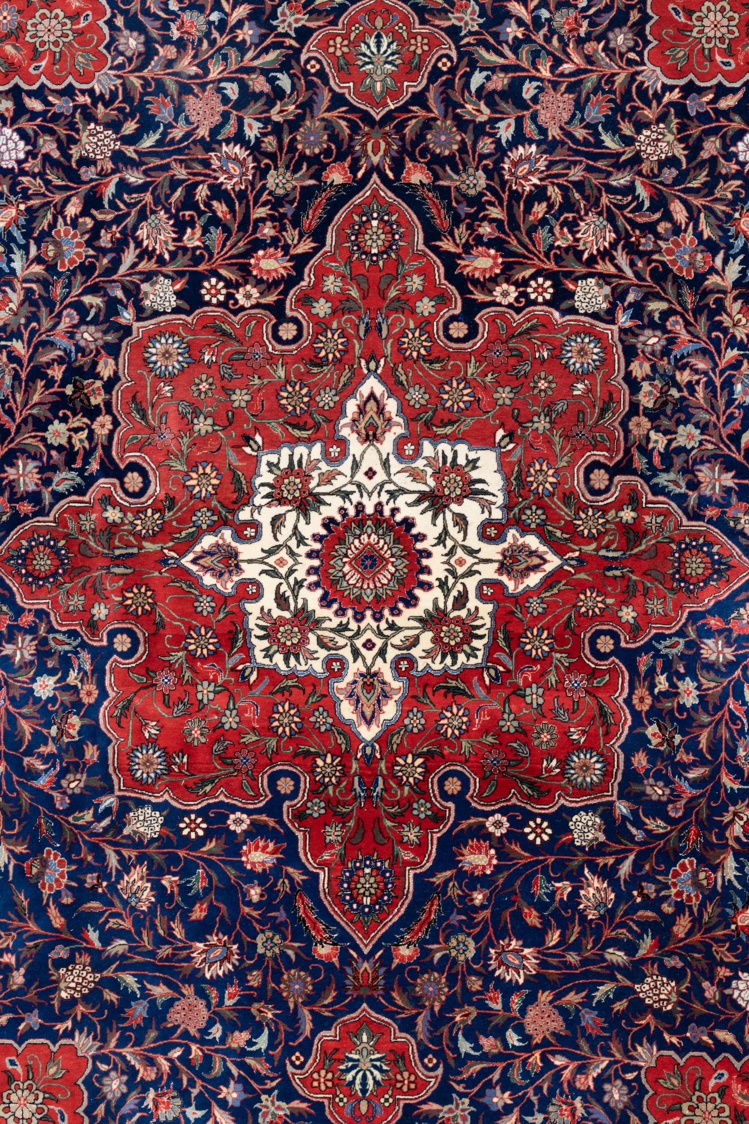 A Chinese Tabriz Style Wool Rug
