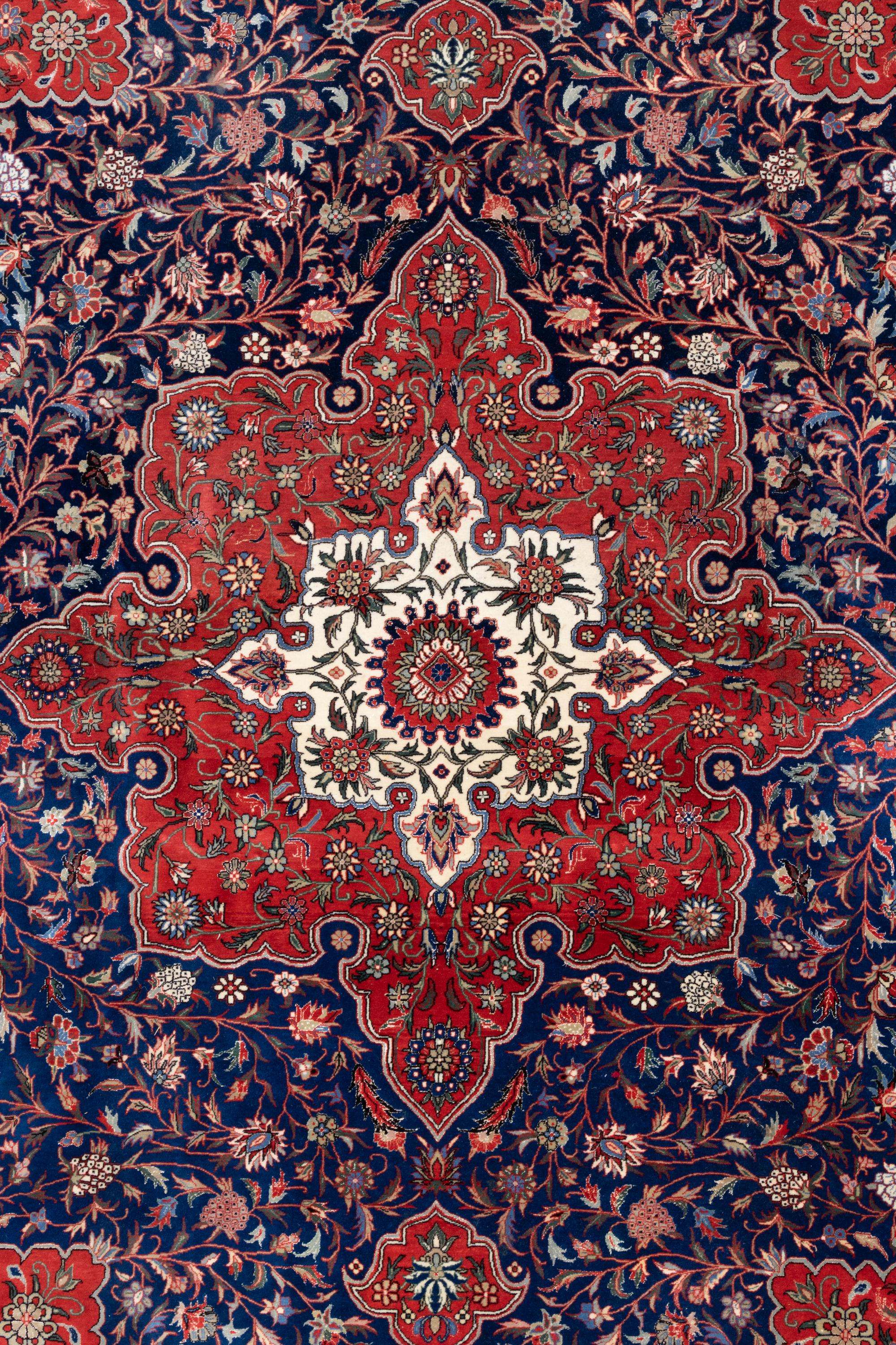 A Chinese Tabriz Style Wool Rug