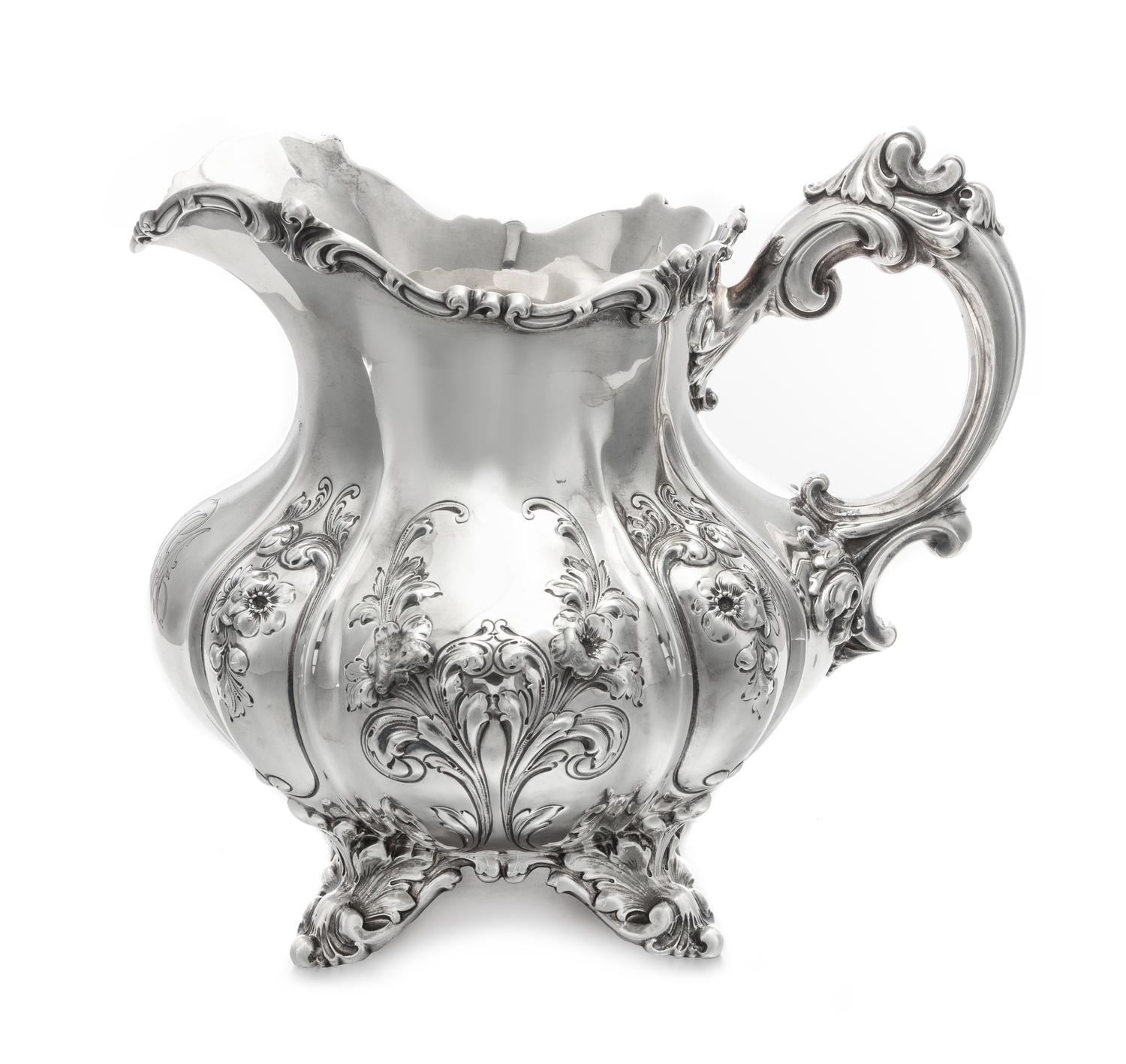 An American Silver Water Pitcher, Theodore B. Starr, New York, NY, Late 19th/Early 20th Century, the squat, baluster form body worked t