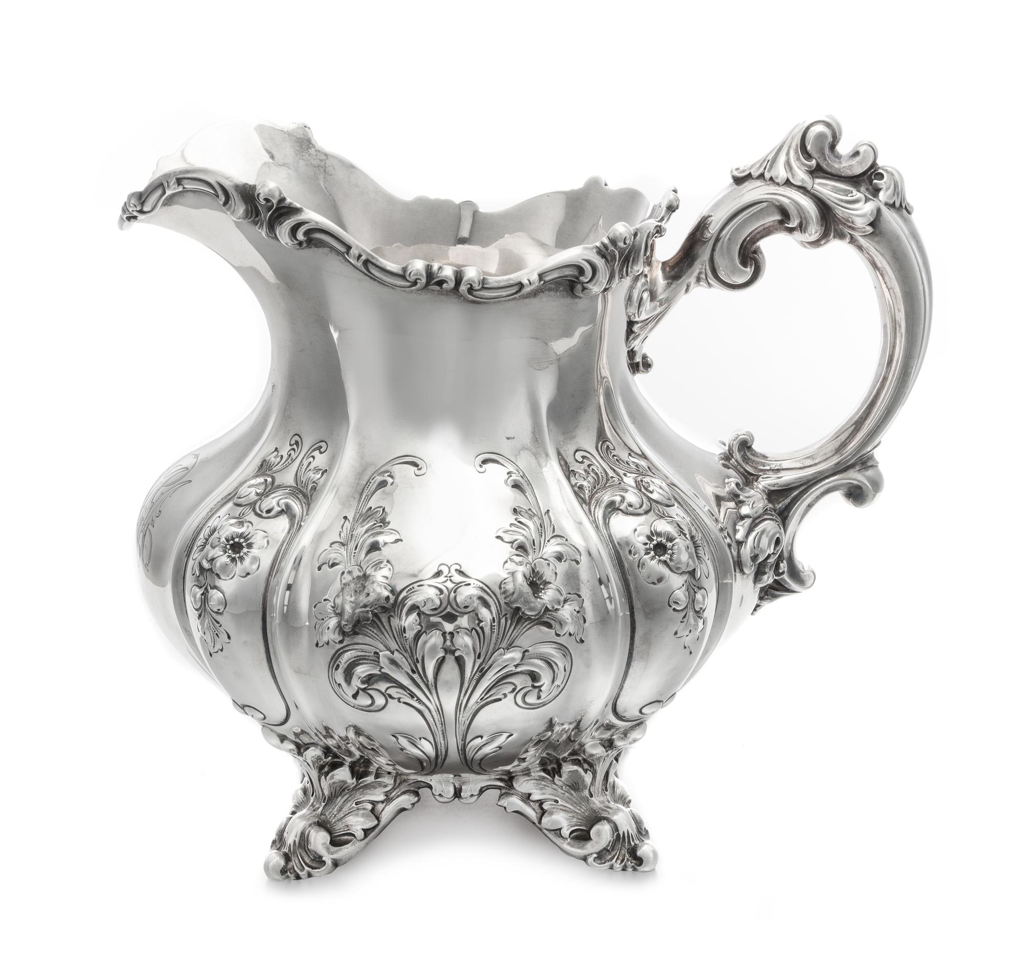 An American Silver Water Pitcher, Theodore B. Starr, New York, NY, Late 19th/Early 20th Century, the squat, baluster form body worked t
