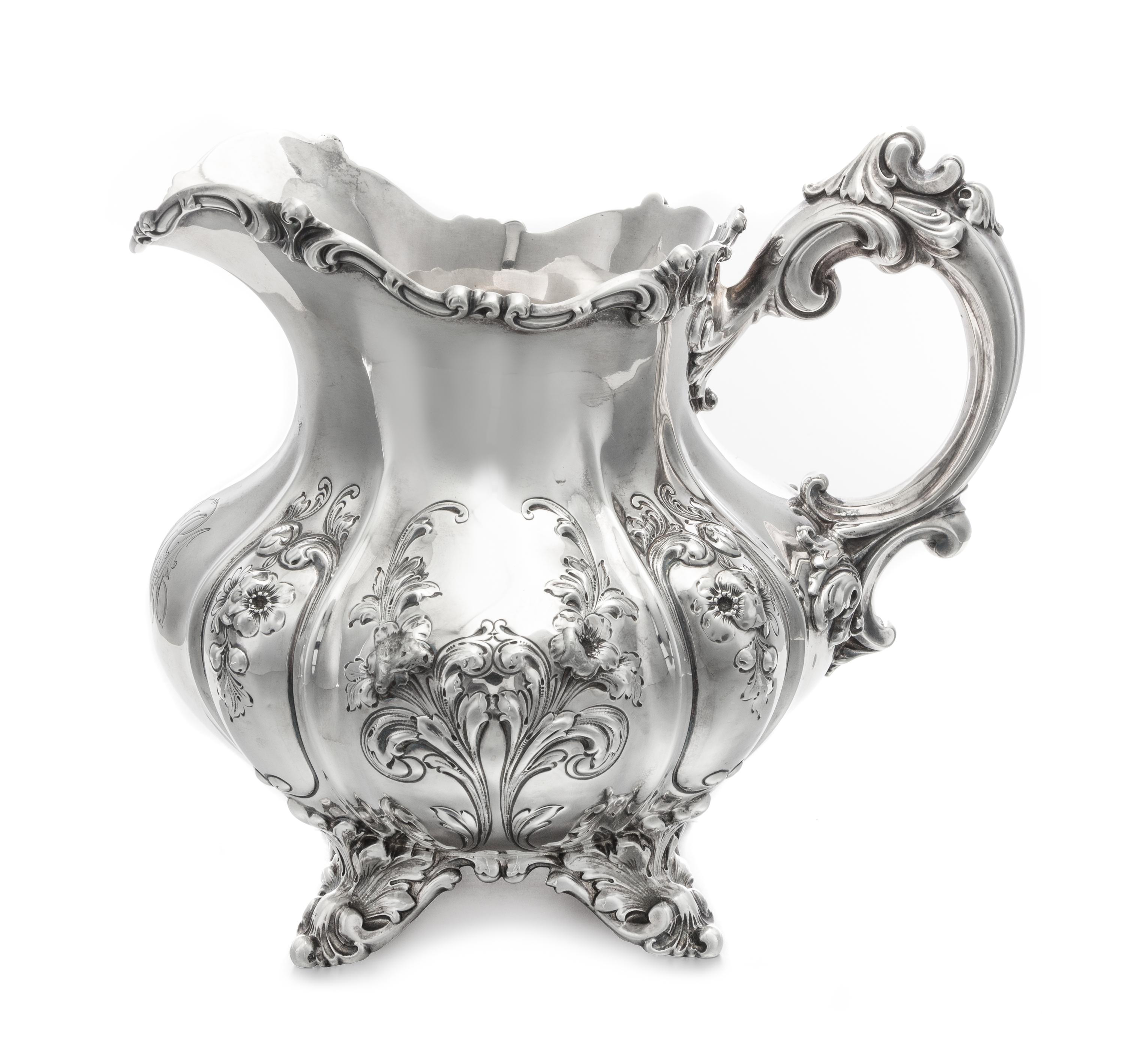 An American Silver Water Pitcher, Theodore B. Starr, New York, NY, Late 19th/Early 20th Century, the squat, baluster form body worked t