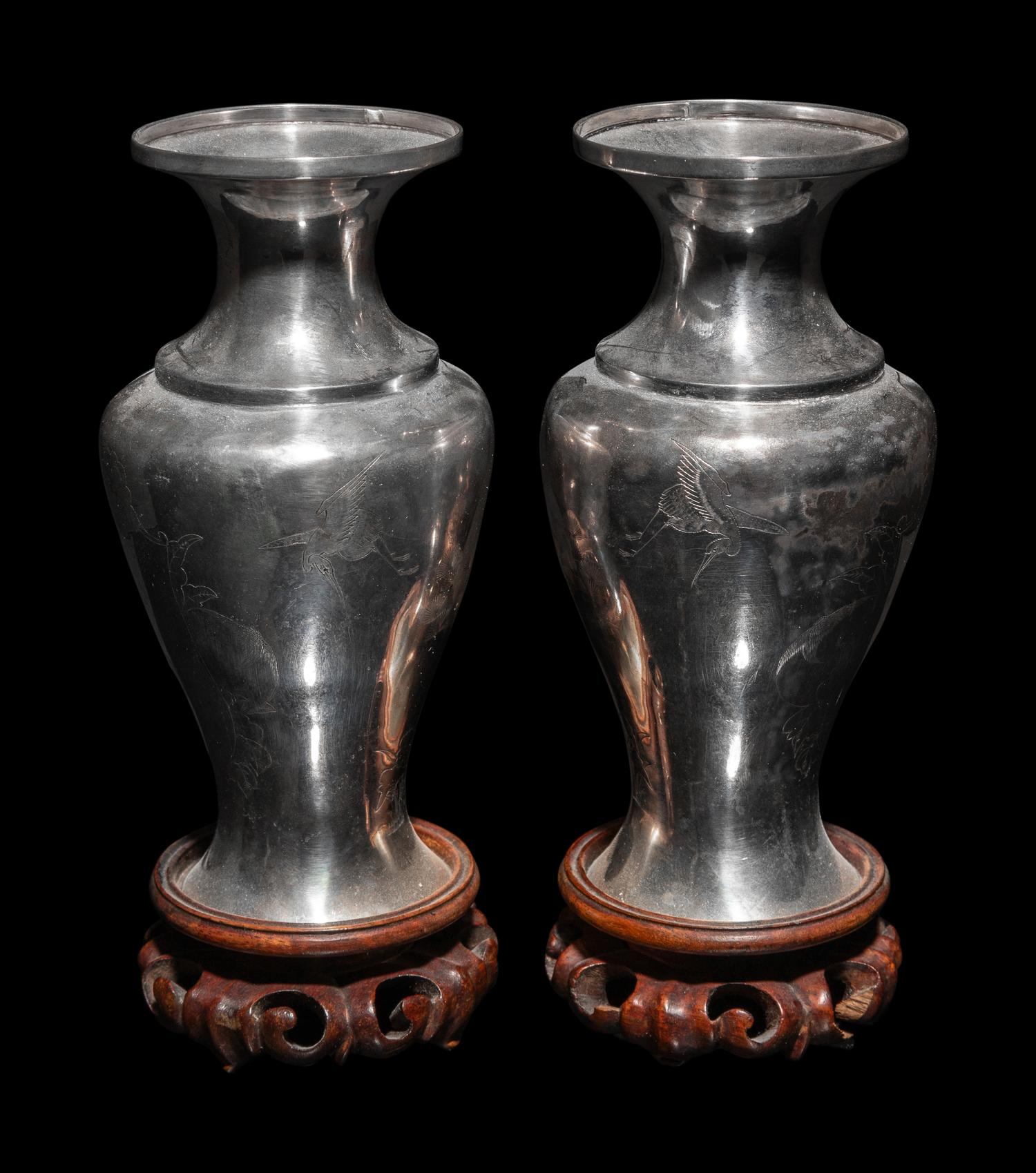 A Pair of Japanese Incised Silver Vases