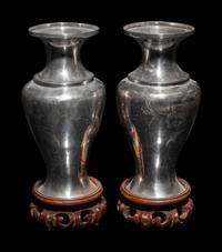 A Pair of Japanese Incised Silver Vases