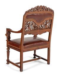 An Italian Renaissance Revival Carved Walnut Throne Chair