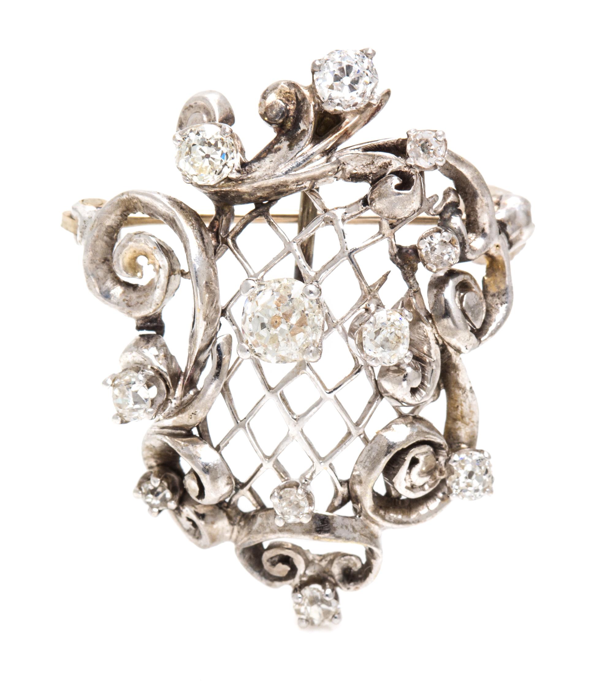 A White Gold and Diamond Pendant/Brooch, 4.10 dwts.