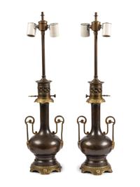 A Pair of French Gilt and Patinated Cast Metal Table Lamps