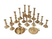 A Large Group of English Brass Candlesticks and Chambersticks