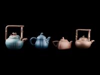 Four Chinese Yixing Ware Teapots
