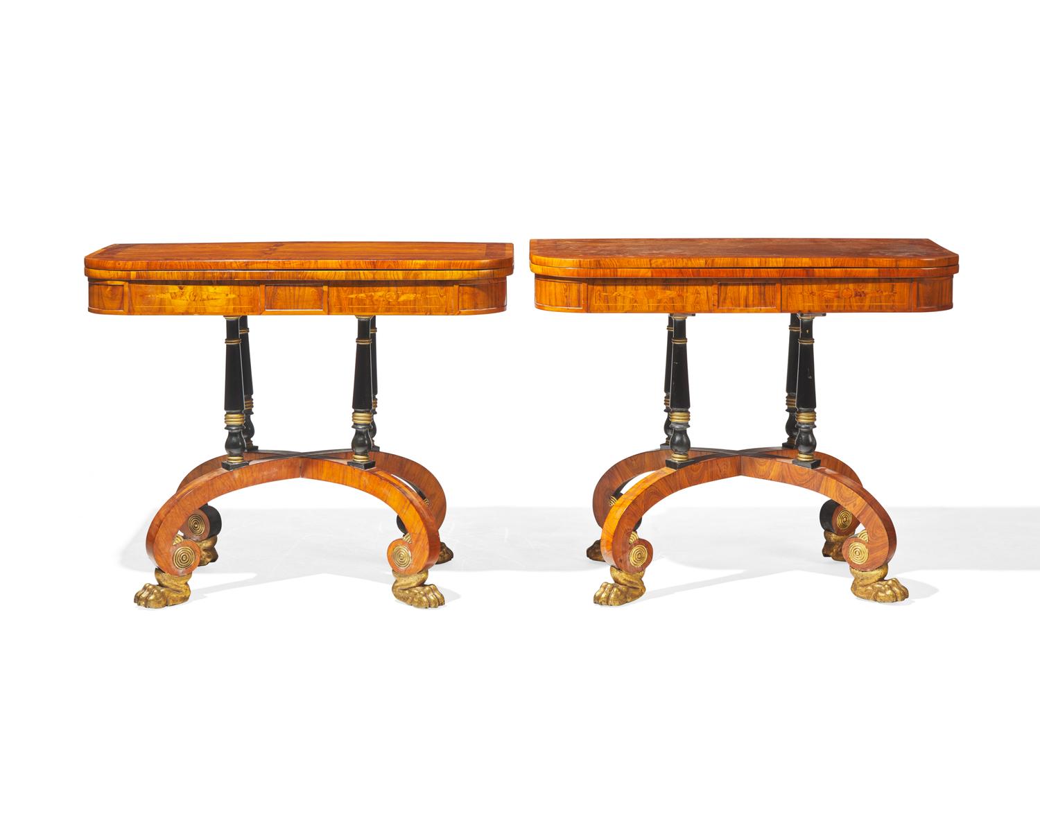 An impressive pair of Regency rosewood and parcel-gilt and ebonized games tables, circa 1820