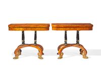 An impressive pair of Regency rosewood and parcel-gilt and ebonized games tables, circa 1820