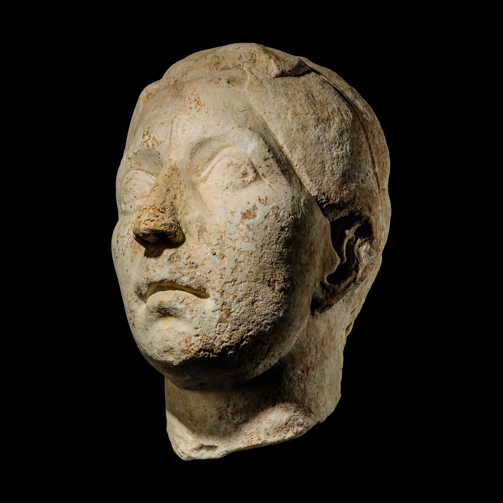 A Roman Marble Head of a Woman