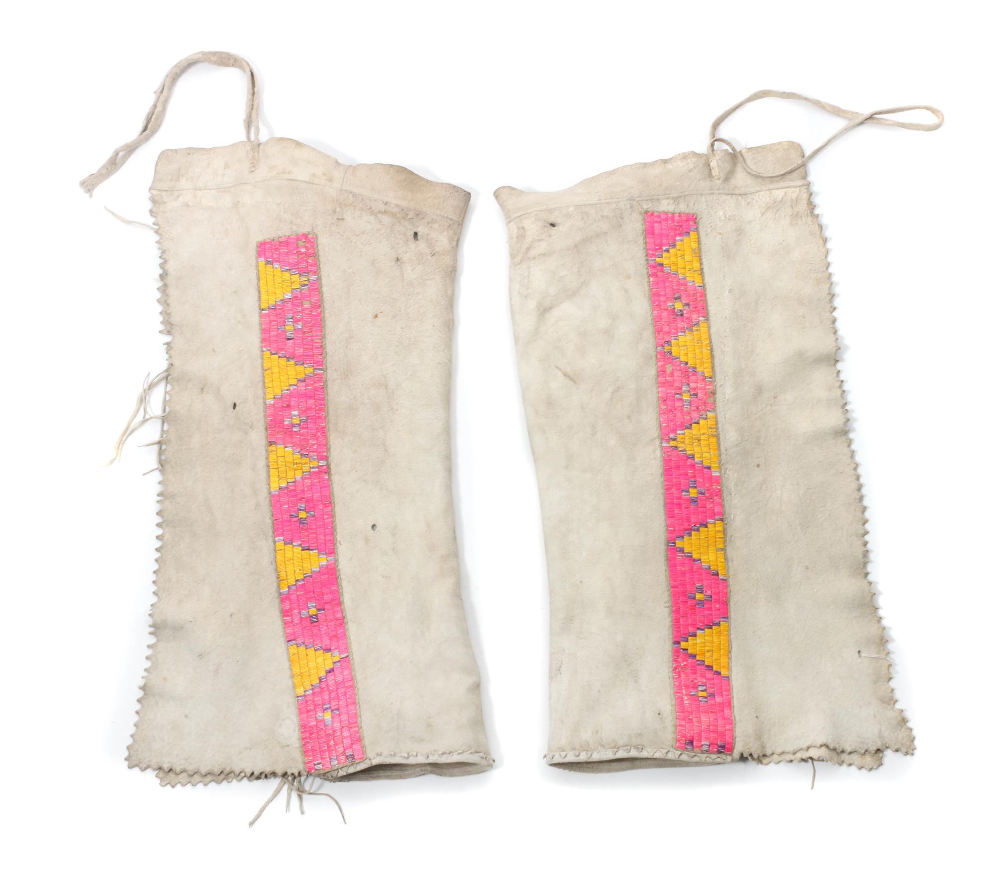 Two Pairs of Blackfeet Quilled Leggings Length of first 33 1/2 inches.